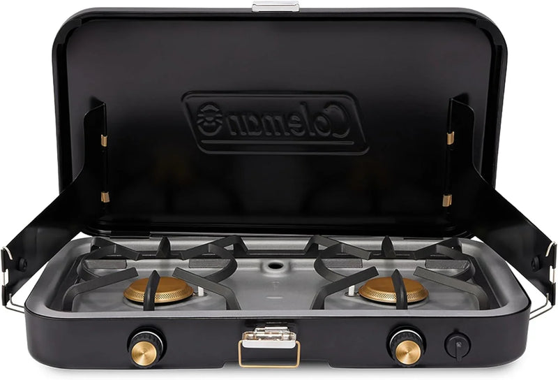 The 1900 series three-in-one propane camping stove, featuring a cast iron grill and frying pan accessories, has a power output of 24000 watts. It is equipped with an adjustable flame cover and excellent lighting device, and comes with two adjustable C1